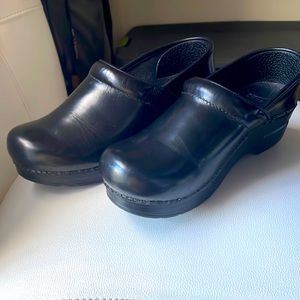 Selling 2 pairs of gently used Leather Dansko clogs.